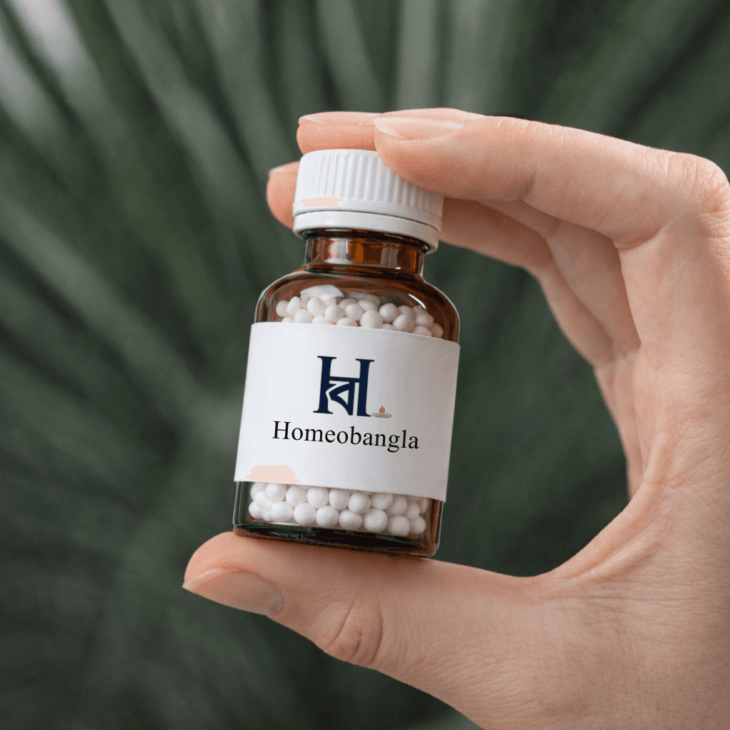 A vial of homoeopathic globules labelled Homoeo Bangla